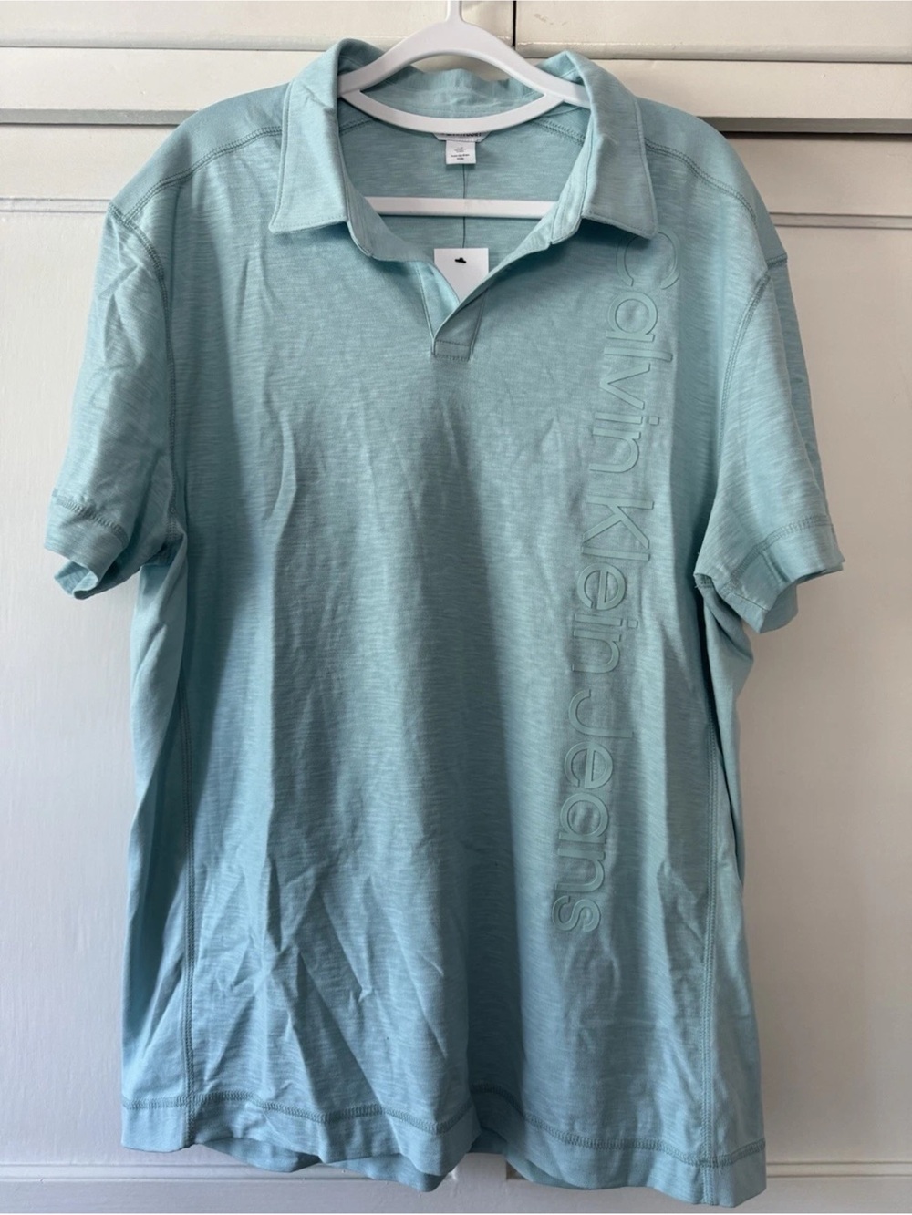 Calvin Klein Jeans Men’s Light Aqua Polo with Vertical Logo